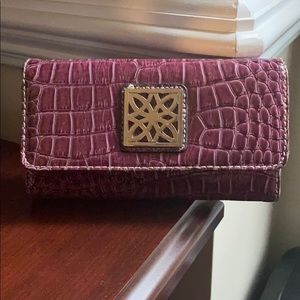 Pocketbook with checks space.